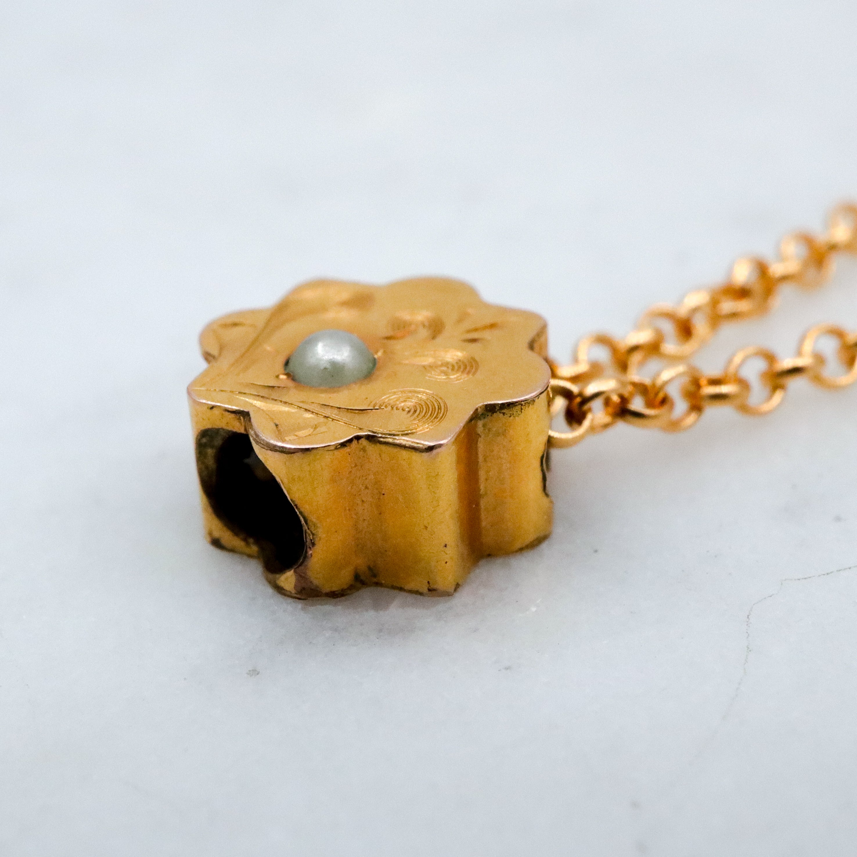 Antique Victorian 9k gold floral engraved slide charm necklace
